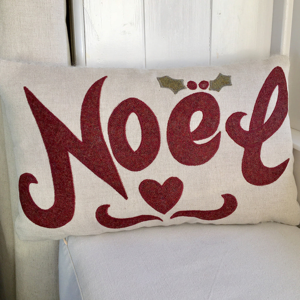 Handmade vintage red Noel cushion.