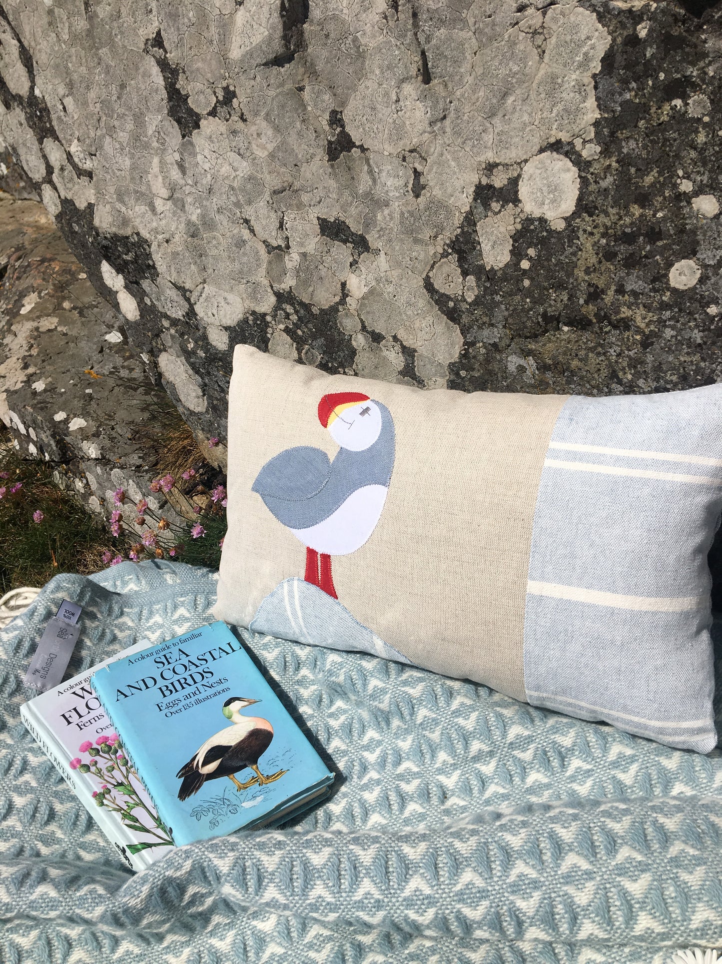 Handmade blue puffin cushion